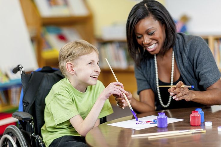 Support worker assisting participant with personal care at home